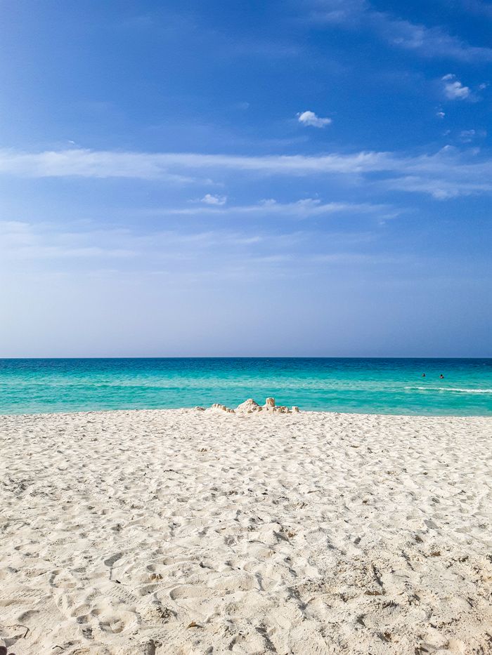 hero-img-02 Relaxing view of white sand and azure waters in Villa Clara, Cuba.